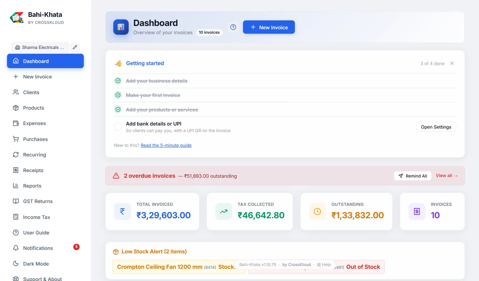 The Dashboard with an overdue invoice, the four totals and low stock.